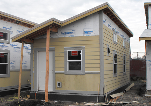 Exterior doors are being installed in the Alder.